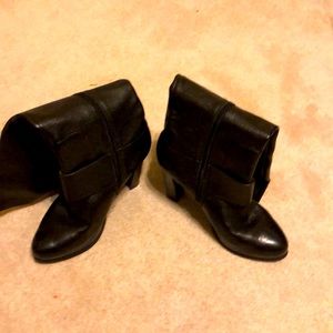 Black over the calf boots.